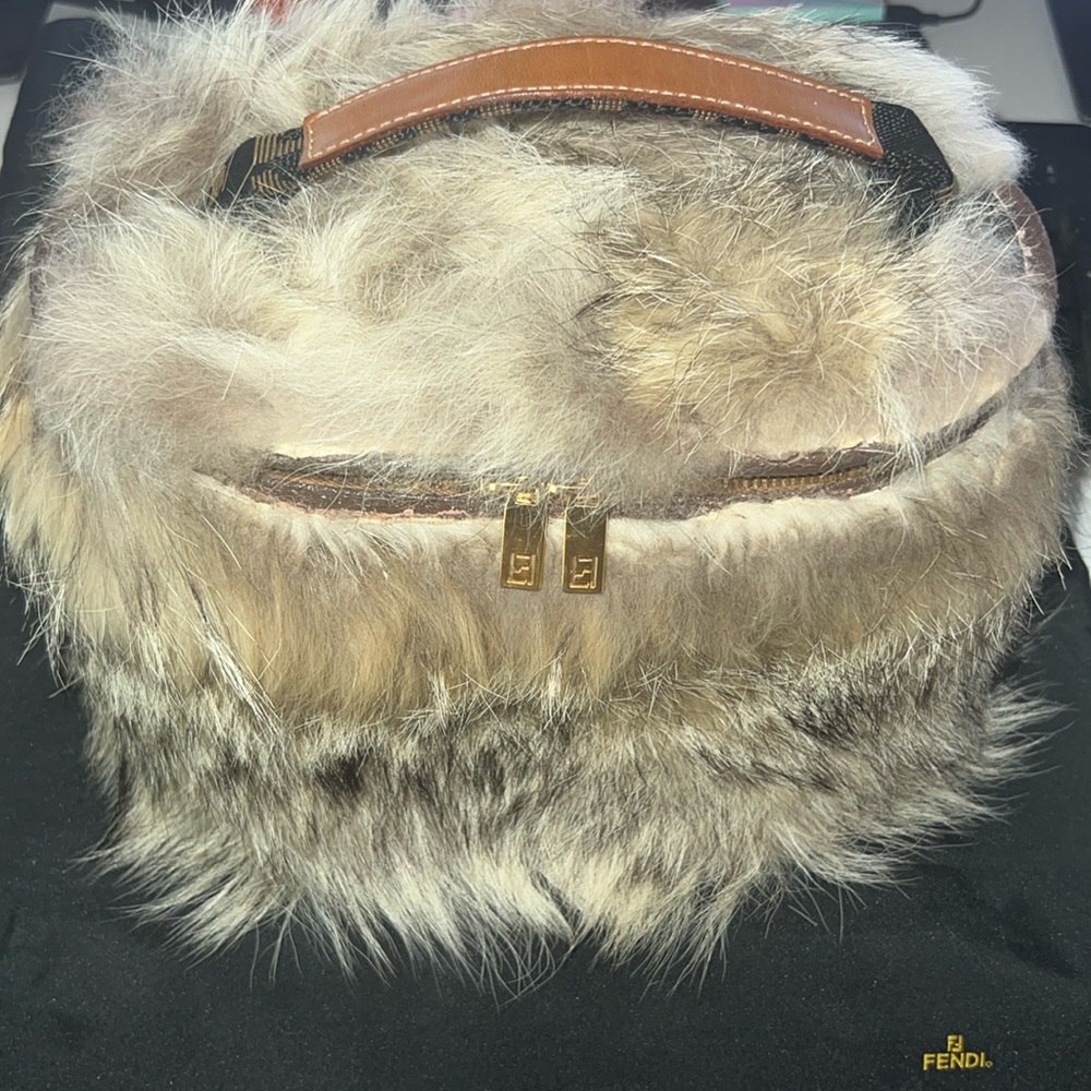 Vintage Fendi vanity bag. Large size repurposed with authentic Raccoon fur